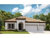 Charming single-story home featuring a tile roof, arched entryway, and a two-car garage at 8818 Eastwyck Dr, Parrish, FL 34219