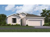 Charming single-story home features a two-car garage, neutral color palette, and beautifully landscaped front yard at 3603 Night Star Ter, Parrish, FL 34219