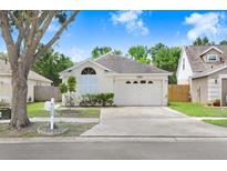 Charming one-story home featuring a well-maintained lawn and inviting curb appeal at 6801 Summer Cove Dr, Riverview, FL 33578