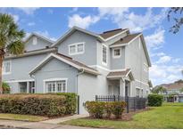 Charming townhouse with neutral paint, a well maintained lawn, and inviting curb appeal at 10966 Winter Crest Dr, Riverview, FL 33569