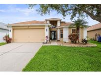 Charming single-Gathering home with a well-manicured lawn and inviting front entrance at 826 Addison Ne Dr, St Petersburg, FL 33716