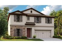 Charming two-story home featuring stone accents, neutral siding, and a two-car garage at 14740 Summer Branch Dr, Lithia, FL 33547