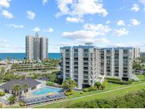 Beautiful ocean view condos, tropical landscaping, and pool offer a luxurious living experience at 1501 Gulf Blvd # 201, Clearwater Beach, FL 33767