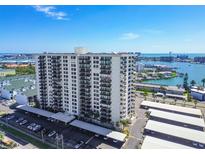 A high-rise condo building with waterfront views and convenient covered parking at 400 Island Way # 502, Clearwater Beach, FL 33767