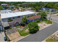 Charming neighborhood featuring colorful homes and lush greenery at 703/709 Patterson St, Clearwater, FL 33756