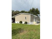 Well maintained single-story home with a carport and easy to maintain landscaping at 5105 Wood St, Zephyrhills, FL 33542