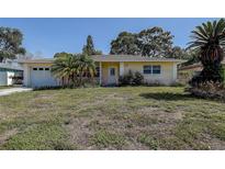 Charming one-story home with a well-maintained lawn and attached garage at 5483 37Th N Ave, St Petersburg, FL 33710