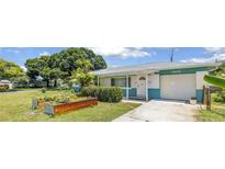 Charming single-story home with a well-maintained lawn and cozy curb appeal at 6195 28Th N Ave, St Petersburg, FL 33710