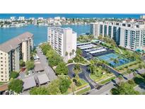Waterfront condo complex boasts lush landscaping, covered parking, tennis courts, and beautiful views at 660 Island Way #206 # 206, Clearwater, FL 33767