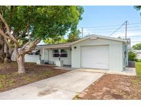 Charming single-story home with a well-maintained front yard and attached one car garage, perfect for first-time home buyers at 3547 Morley Dr, New Port Richey, FL 34652