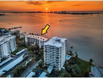 Stunning condo complex with waterfront views and a bright sunrise providing a luxurious living experience at 55 Rogers St # 502, Clearwater, FL 33756