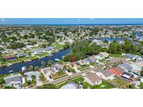 Waterfront property with boat dock on canal in a residential neighborhood near the ocean at 318 Lookout Dr, Apollo Beach, FL 33572