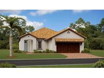 Charming single-story home featuring a light exterior, brown tile roof, and a two-car garage at 17140 Holly Well Ave, Wimauma, FL 33598