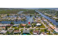 Waterfront homes with canal access, lush landscaping, and an incredible view of the surrounding waterways at 12829 3Rd Isle, Hudson, FL 34667