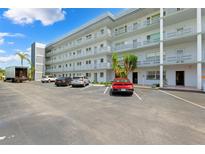A well maintained, multi-story condo building featuring ample parking and easy access at 3018 59Th S St # 405, Gulfport, FL 33707