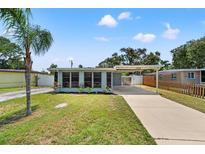 Charming single-story home with a well-maintained lawn and convenient carport, a delightful curb appeal at 11829 104Th St, Largo, FL 33773