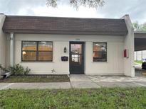 Charming single story home with simple landscaping and designated parking at 1286 Mission Hills Blvd, Clearwater, FL 33759