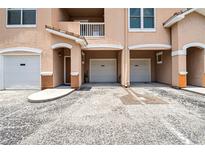 Charming townhome featuring private garage and entryway for convenient and secure access to the residence at 17996 Villa Creek Dr # 17996, Tampa, FL 33647