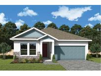 Charming single-story home with a two-car garage, stone accents, and well-manicured landscaping at 10648 Crescent Creek Xing, Parrish, FL 34219