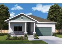 Inviting single-story home featuring a two-car garage, covered entryway, and manicured lawn at 11858 Richmond Trl, Parrish, FL 34219