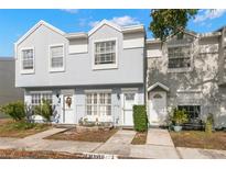 Charming townhome featuring well-maintained landscaping, and reserved parking out front at 6681 121St Ave # I, Largo, FL 33773