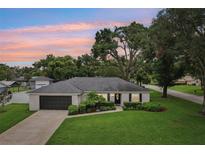 Charming single-story home featuring a well-manicured lawn and brick exterior at 1513 Loretta Ct, Brandon, FL 33511