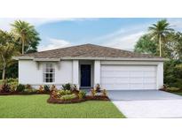 Charming one-story home featuring manicured landscaping and a two-car garage at 1217 Cape Chestnut Pl, Ruskin, FL 33570