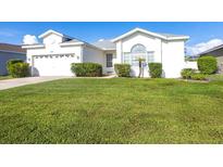 Charming single-story home with a well-manicured lawn and lush landscaping at 5017 46Th W St, Bradenton, FL 34210