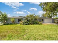 Charming single-story home features a well-manicured lawn and inviting curb appeal at 602 Hillpoint Way, Brandon, FL 33510