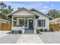 Charming home featuring updated landscaping, new walkway and relaxing front porch with swing at 650 63Rd S Ave, St Petersburg, FL 33705