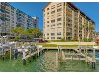Waterfront condo complex with boat slips and lift offers easy access to Gulf of Mexico waters at 650 Island Way # 606, Clearwater Beach, FL 33767
