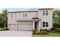 Charming two-story home with a three-car garage, well-manicured lawn, and tasteful landscaping at 19727 Gladeview Way, Land O Lakes, FL 34638
