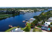 Aerial view of waterfront property with canal access and space for a dock at 2205 N Riverside Dr, Tampa, FL 33602