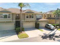 Charming two-story townhomes featuring attached garages and well-maintained landscaping in a desirable neighborhood at 6677 84Th N Ave, Pinellas Park, FL 33781
