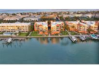 Stunning waterfront condos with private boat docks offer a luxurious coastal lifestyle and convenient access to the open water at 610 Pinellas Bayway S # 5202, Tierra Verde, FL 33715