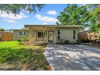 Charming single-story home with a covered porch and well-maintained front yard at 8537 93Rd Ave, Seminole, FL 33777