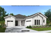 Beautiful one story home featuring white sidings, stone accents, dark roof, manicured lawn and a two car garage at 4612 Southern Valley Loop, Brooksville, FL 34601
