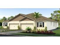 Charming single-story home featuring a two-car garage and lush landscaping at 4021 Westwood Fields Loop, Plant City, FL 33565
