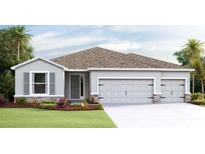 Charming single-story home with a three-car garage and stone accents at 4024 Harvest Hearth Pl, Plant City, FL 33565