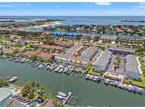 Waterfront condos offer stunning views and boat docks, perfect for coastal living at 751 Pinellas Bayway S # 104, St Petersburg, FL 33715
