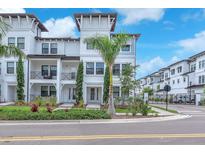 Beautiful three-story home with manicured landscaping and a private balcony at 5351 Bridge St # 16, Tampa, FL 33611