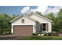 Charming single-story home with a well-manicured lawn and a two-car garage at 4294 Cairoli Ct, Wesley Chapel, FL 33543