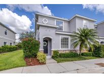 Charming two-story home featuring decorative stone accents and lush landscaping at 2020 Greenwood Valley Dr, Plant City, FL 33563
