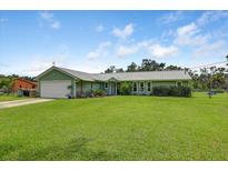 Charming single-story home with a well-maintained lawn and inviting curb appeal at 3515 E 34Th St, Bradenton, FL 34208