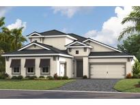 Beautiful two-story home showcasing a manicured lawn, covered windows, and an attached two-car garage at 17510 Glistening Ct, Venice, FL 34293