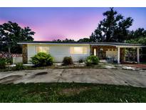 Charming single-story home featuring stone accents, a covered carport, and well-maintained landscaping at 3601 27Th S Ave, St Petersburg, FL 33711