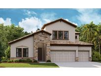 Beautiful two-story home featuring stone accents, a tile roof, and a spacious three-car garage at 8847 Eastwyck Dr, Parrish, FL 34219