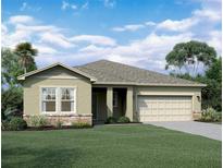 Charming single-story home featuring a two-car garage, stone accents, and a well-manicured lawn at 14710 Italy Ave, Dade City, FL 33523