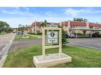 Community signage for Long Bayou Building 2 located at 10033 64th Ave N at 10033 64Th N Ave # 4, St Petersburg, FL 33708