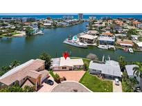 Waterfront home with boat dock and scenic views of the water and neighboring community at 17444 2Nd E St, Redington Shores, FL 33708